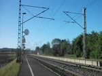 189 064 durchfhrt am 25.Mai 2011 mit einem Getreidezug den Bahnhof Gundelsdorf Richtung Kronach.