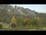 Schsische Schweiz 2008 - Unterhalb der Bastei bei Rathen sind am 15.10.2008 ein S-Bahnzug aus Bad Schandau nach Dresden sowie ein EuroCity nach Prag unterwegs, welcher von einer weiteren S-Bahn verfolgt wird. Die Baureihe 143 vor den S-Bahnzgen wird vorraussichtlich im Dezember 2010 durch Loks der BR 145 oder 182 abgelst.