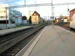 Zugsbegegnung mit ICN und grner Re 4/4 II mit IR nach Basel SBB in Pratteln am 27.07.2010