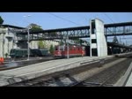 Schweiz 2012 - Eine Doppeltraktion aus Re 4/4 und Re 6/6 durcheilt am 23.6.2012 mit einem Gterzug den Bahnhof von Spiez.