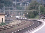 Re 10/10 mit Zingg/Schni Express bei der Durchfahrt in Faido am 19.09.2007