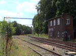 742 194-4 mit einem Schadwagenzug am 19.07.16 bei der Einfahrt in Vojtanov.